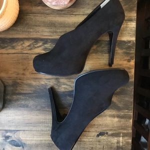 Black clog style bootie heels